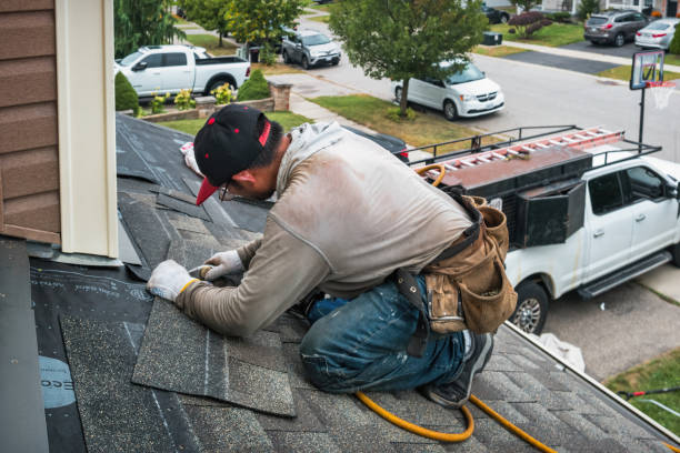 Professional Gutter Repair And Installation technician working in Florida, NY